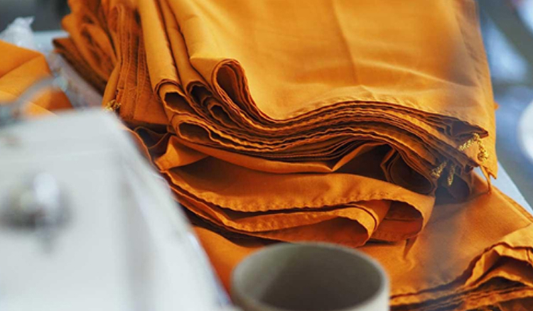 Temple converts plastics to orange robes